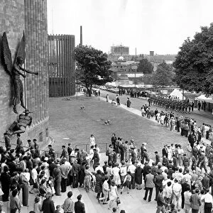 Members of the armed forces entering Coventry cathedral from Priory Street to take part