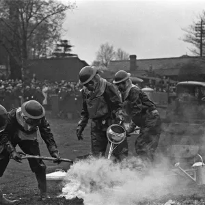 Members of the ARP demonstrate how to deal with a suspected gas attack during a series of Members of the ARP demonstrate how to deal with a suspected gas attack during a series of