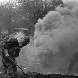 Members of the ARP demonstrate how to deal with a suspected gas attack during a series of Members of the ARP demonstrate how to deal with a suspected gas attack during a series of
