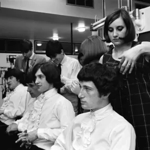 Members of the British pop group The Kinks having their hair styled at a salon Members of the British pop group The Kinks having their hair styled at a salon