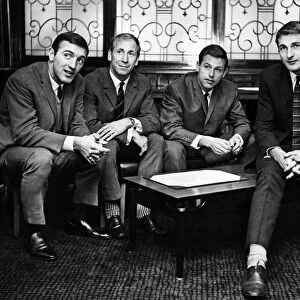 Four members of the England team relax at their Liverpool Hotel. Left to Right