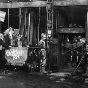 Black and white print of A.R.P. squad at Fforchaman colliery pit head, 1938
