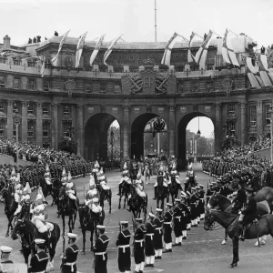 Members of the Household Cavalry part of Her Majesty Procession make their way through Members of the Household Cavalry part of Her Majesty Procession make their way through