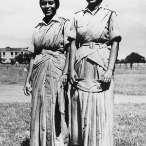 Two members of the Indian Womens Auxillary Corps wearing saris