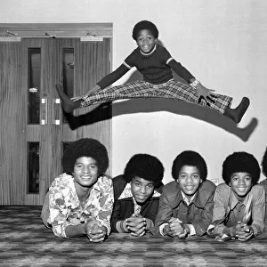 Members of the Jackson Five pop group become the Jackson Six when the latest addition to