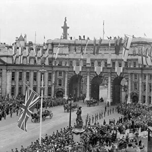 Members of the Royal Family pass under Admiralty Arch London during the Victory Day