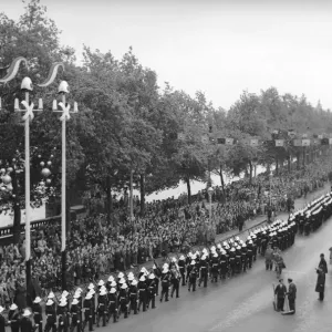 Members of the Royal Marines march down Victoria Embankment accompanying the Queen Members of the Royal Marines march down Victoria Embankment accompanying the Queen