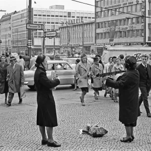 Members of the Salvation Army perform on the corner of Passauer Strasse