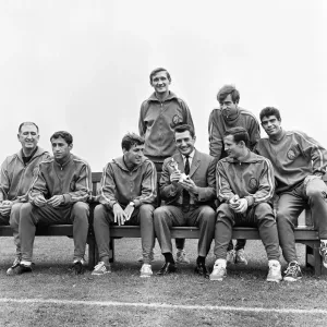 Members of the Spain football squad take a look a the Jules Rimet World Cup trophy at a Members of the Spain football squad take a look a the Jules Rimet World Cup trophy at a