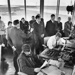 Members of the town urban council get a close up view of the inside of the control tower Members of the town urban council get a close up view of the inside of the control tower