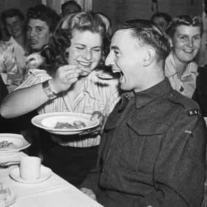 Members of the West Mersey W. L. A and their boy friends attend a Harvest Home supper in a