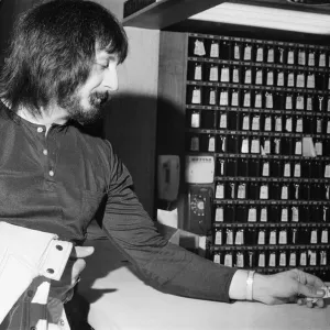 Members of The Who rock group. Bass guitarist John Entwistle hands in his hotel key Members of The Who rock group. Bass guitarist John Entwistle hands in his hotel key