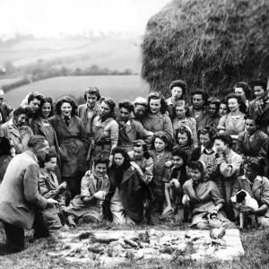 Black and white print of Women's Land Army members in training