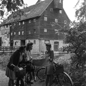 Members of the Youth Hostel Association at Houghton Mill in Houghton, Cambridgeshire Members of the Youth Hostel Association at Houghton Mill in Houghton, Cambridgeshire