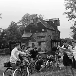 Members of the Youth Hostel Association at Houghton Mill in Houghton, Cambridgeshire Members of the Youth Hostel Association at Houghton Mill in Houghton, Cambridgeshire