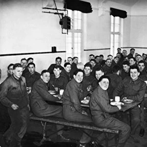 Men of the East Riding Yeomanry in the barracks messroom somewhere in the south of