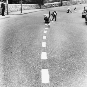 Men painting blackout lines on the road. 27th August 1939 Men painting blackout lines on the road. 27th August 1939