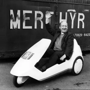 Print of the Rev Bill Morgan in a Sinclair C5 Print of the Rev Bill Morgan in a Sinclair C5
