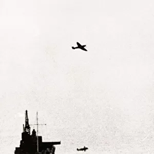 A Messerschmitt 109 and a MK II Spitfire dogfight over the outer harbour of Dover at