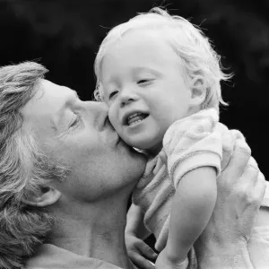 Michael Aspel pictured at home with his family. September 1982 Michael Aspel pictured at home with his family. September 1982