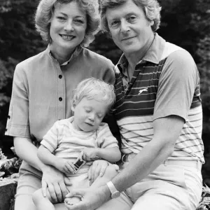 Michael Aspel pictured at home with his wife Lizzie Power and their son. September 1982 Michael Aspel pictured at home with his wife Lizzie Power and their son. September 1982