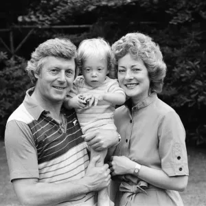 Michael Aspel pictured at home with his wife Lizzie Power and their son. September 1982 Michael Aspel pictured at home with his wife Lizzie Power and their son. September 1982