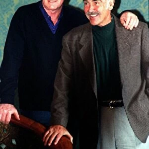 Michael Caine (L) and Sean Connery August 1997 face the press at the Caldonian Hotel in