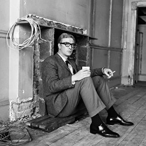 Michael Caine on the set of The Ipcress File. 21st September 1964