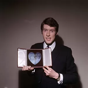 Michael Crawford Actor with his Variety Club Silver Heart Award for 1965