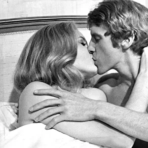 Michael Crawford kissing actress Genevieve Gilles during filming Hello-Goodbye - October