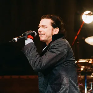 Michael Hutchence lead singer of INXS, pictured in concert - Elegantly Wasted World Tour Michael Hutchence lead singer of INXS, pictured in concert - Elegantly Wasted World Tour