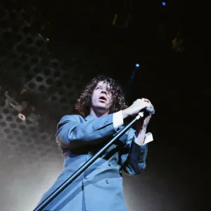 Michael Hutchence lead singer of INXS, pictured in concert - X Factor World Tour - Michael Hutchence lead singer of INXS, pictured in concert - X Factor World Tour -