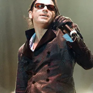 Michael Hutchence lead singer of INXS, pictured in concert - Elegantly Wasted World Tour Michael Hutchence lead singer of INXS, pictured in concert - Elegantly Wasted World Tour