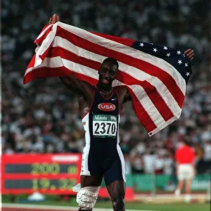 Michael Johnson American athlete celebrates winning the 200m final