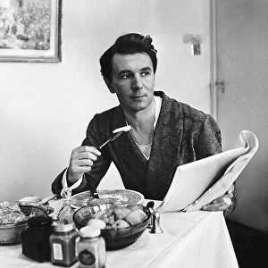 Michael Redgrave actor lunching in his dressing room during a break from filming the Two
