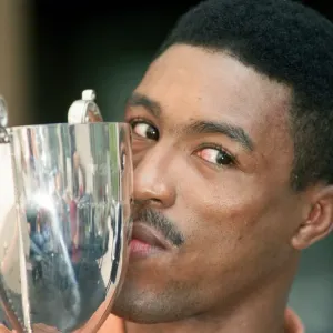 Michael Watson with the British Commonwealth middleweight trophy after defeating Nigel Michael Watson with the British Commonwealth middleweight trophy after defeating Nigel