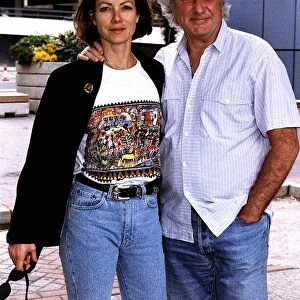 Michael Winner Film Director with actress girlfriend Jenny Seagrove at Heathrow airport