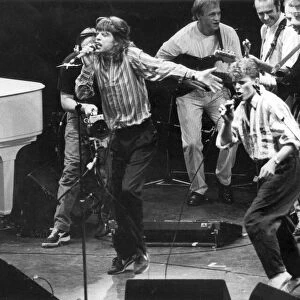 Mick Jagger and David Bowie singing with Dire Straits at Princes Trust concert