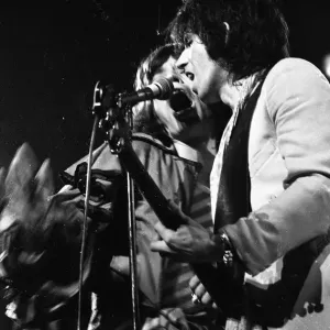 Mick Jagger and Keith Richards performing on stage during a Rolling Stones concert Mick Jagger and Keith Richards performing on stage during a Rolling Stones concert