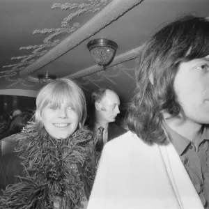Mick Jagger, lead singer of the Rolling Stones pop group with his girlfriend Marianne Mick Jagger, lead singer of the Rolling Stones pop group with his girlfriend Marianne