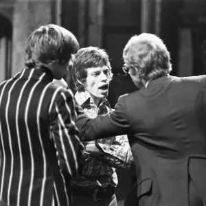 Mick Jagger talking to The Rolling Stones manager Andrew Loog Oldham (right Mick Jagger talking to The Rolling Stones manager Andrew Loog Oldham (right