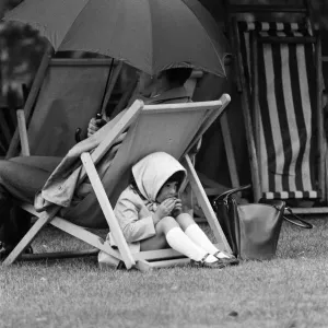 Mid-summers day at St Jamess Park. 4 year old Alison makes her first trip to