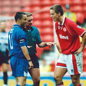 Middlesbroughs Jan Aage Fjortoft and Chelseas Dennis Wise argue with Middlesbroughs Jan Aage Fjortoft and Chelseas Dennis Wise argue with