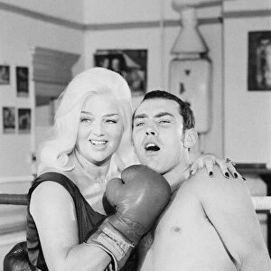 Former Middleweight Champion Alan Minter with singer and Actress Diana Dors at The Thomas
