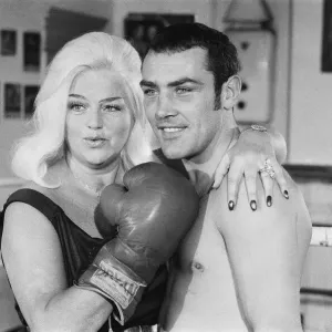 Former Middleweight Champion Alan Minter with singer and Actress Diana Dors at The Thomas