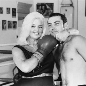 Former Middleweight Champion Alan Minter with singer and Actress Diana Dors at The Thomas