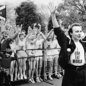 Midge Ure singer pop music infront of runners arms raised at start of race I ran Midge Ure singer pop music infront of runners arms raised at start of race I ran