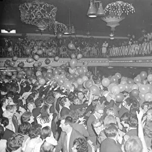 Midnight strikes and 500 balloons cascade on to the dancefloor at the Locarno, Coventry