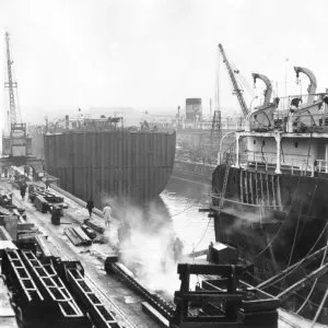 The midshape and stern section of the World Galde during the undocking operation The midshape and stern section of the World Galde during the undocking operation