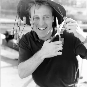 Mike Brosnan TV presenter wearing Australian cork hat Mike Brosnan TV presenter wearing Australian cork hat